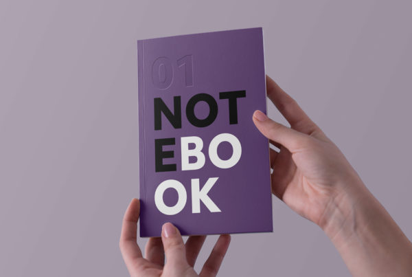 Hands Holding Notebook Mockup