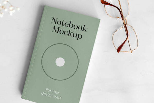 Notebook with Glasses Mockup
