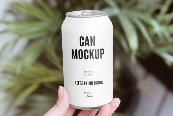 Front view, Aluminum Can Mockup in hand against the flower.