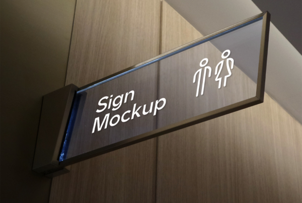 Wayfinding Rectangle glass Sign PSD Mockup attached to the wall inside the building.