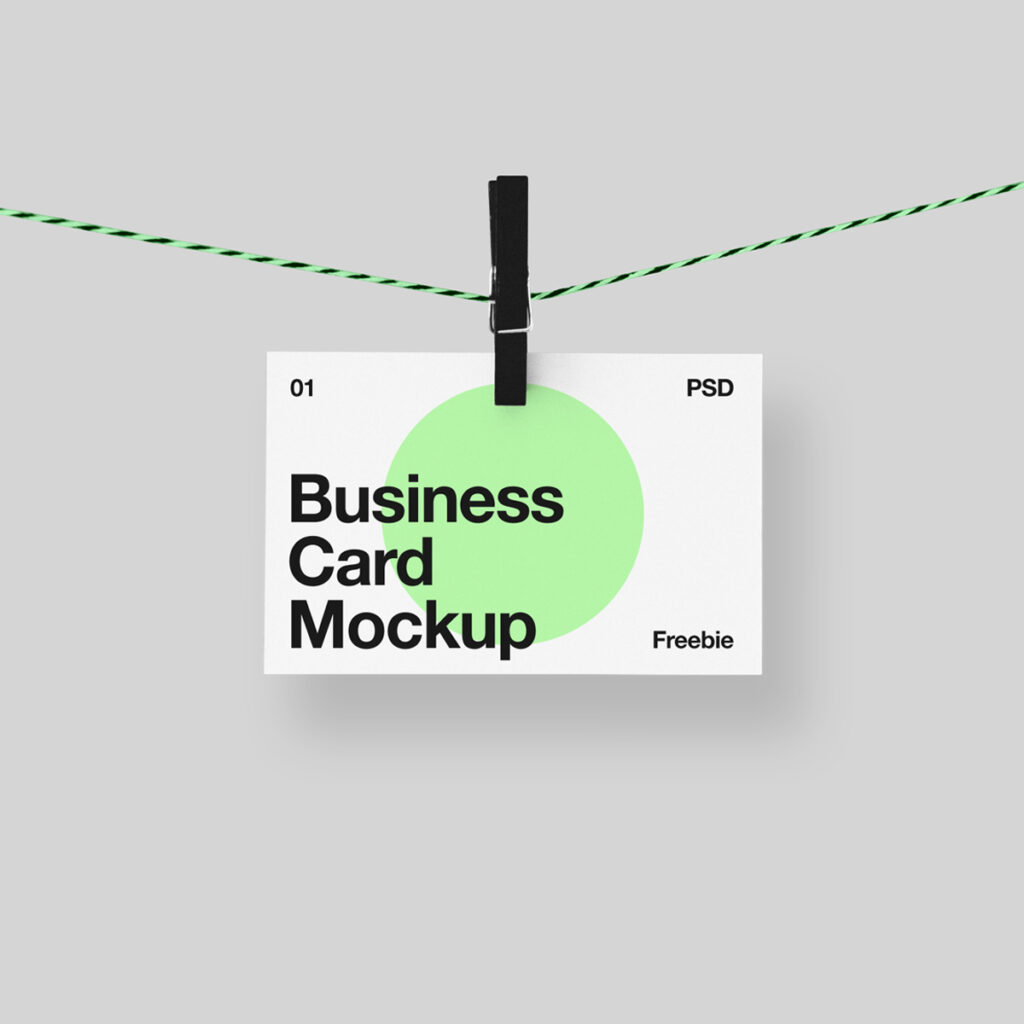 Hanging Business Card Mockup on, a string fastened with a wooden clip.