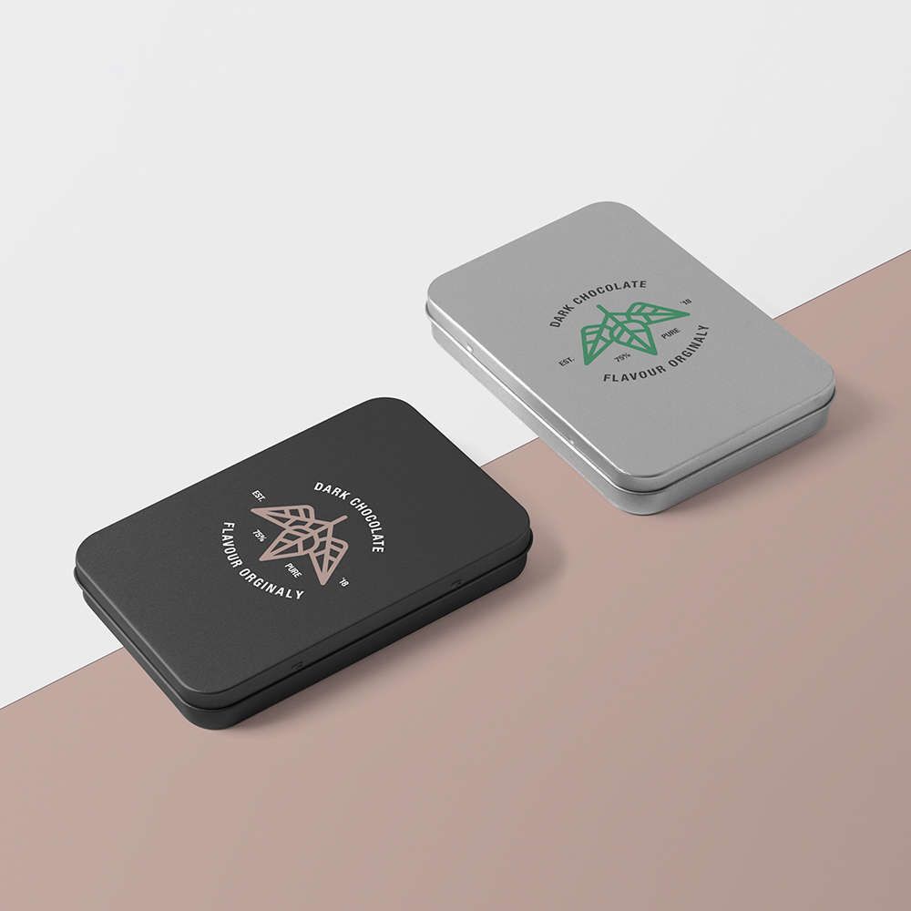 Two same Metal Boxes Mockup lies on the paper floor in two colors.