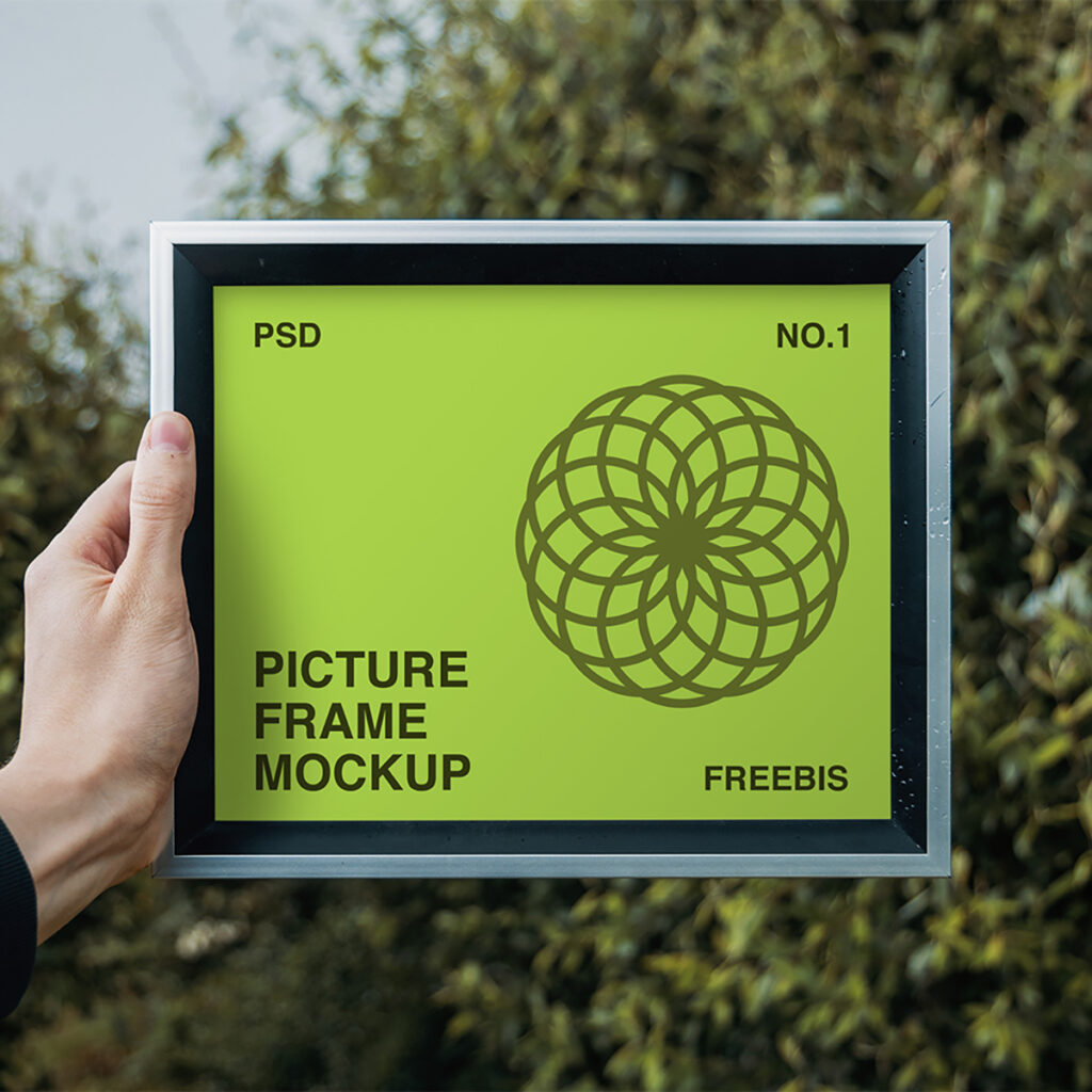 Rectangle Picture Frame Mockup holding in men left hand.