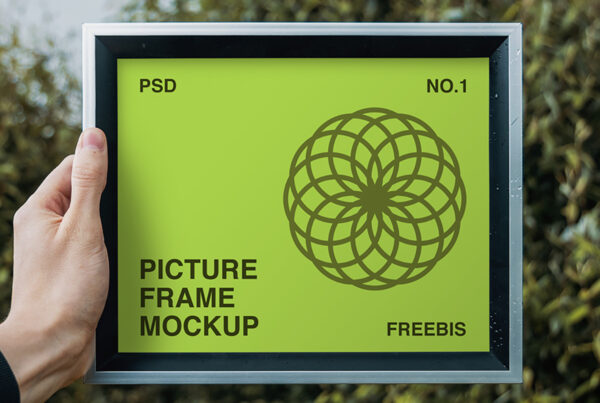 Rectangle Picture Frame Mockup holding in men left hand.