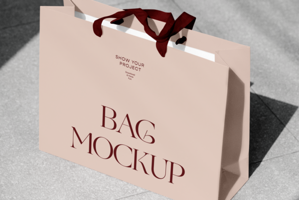 Luxury Shopping Bag on Street Mockup stands on a marble floor.