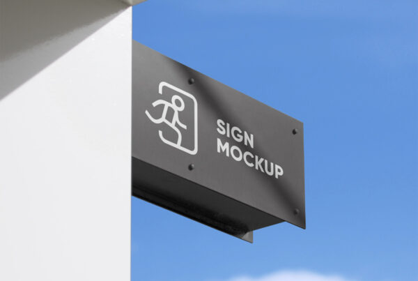 Rectangle metal Signage on Building Mockup against sky view.