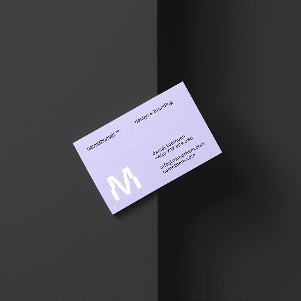 Business Card Mockup seen from above and lie on the top black cubic.