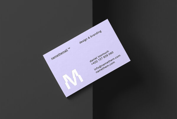 Business Card Mockup seen from above and lie on the top black cubic.