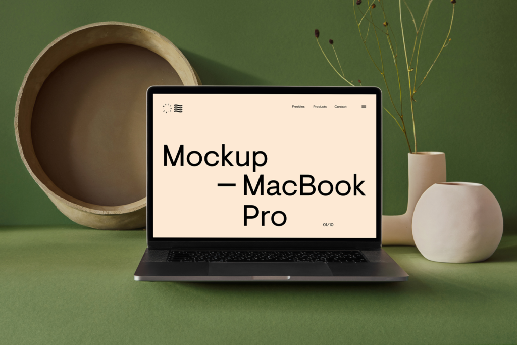 Front view open MacBook Pro with Vase Mockup on the green floor.