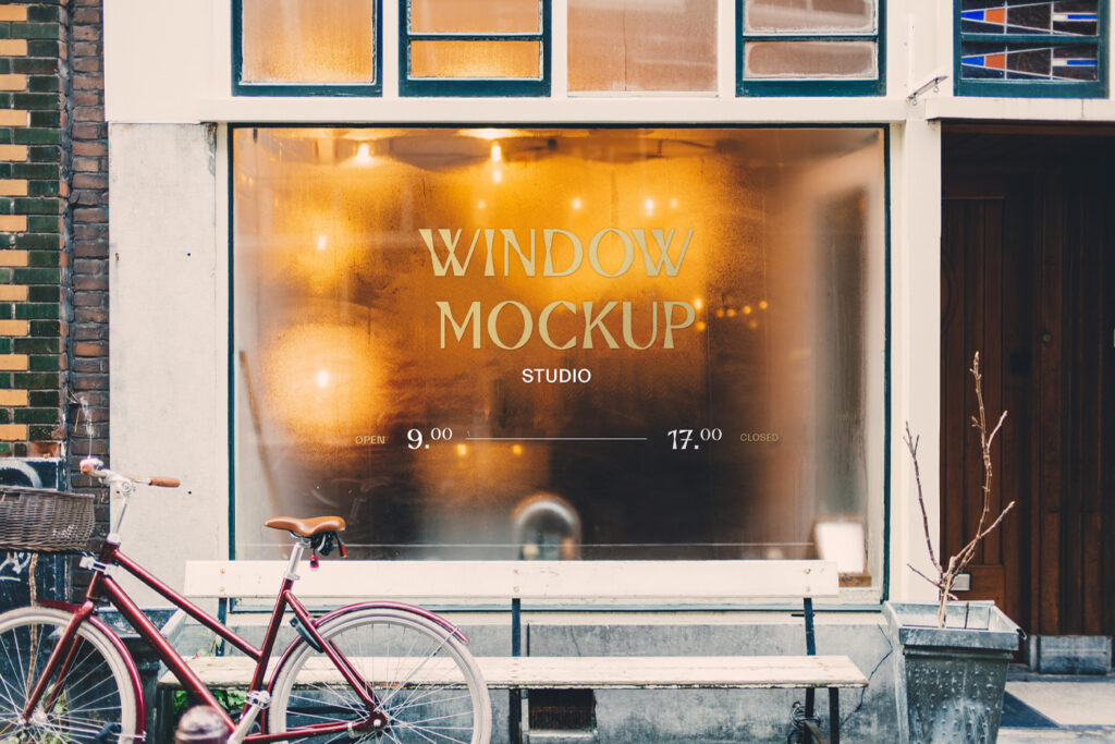 Front view glass Sign on Window Mockup located on the facade of the building.