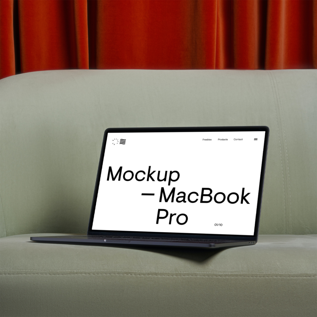 Open a MacBook Pro Mockup on the pastel green couch and rose red curtain behind the couch.