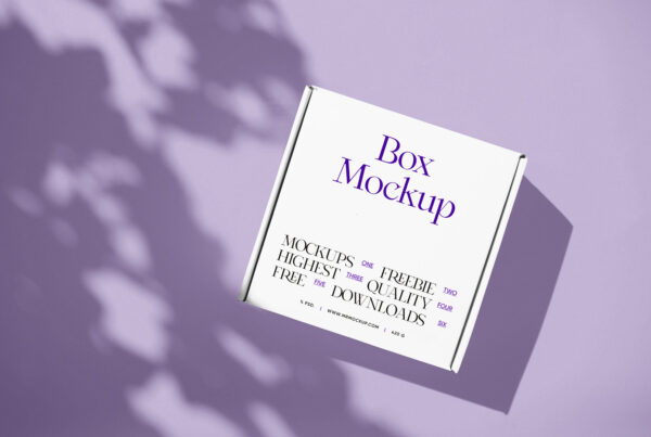 A white paper box mockup lies on the purple floor, with shadow across the entire composition.