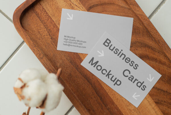 Business card's mockup lying on the wooden tray.