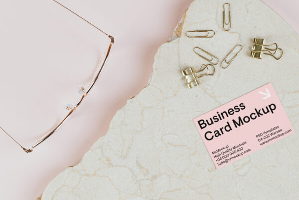 Business card mockup lying on a piece of marble.
