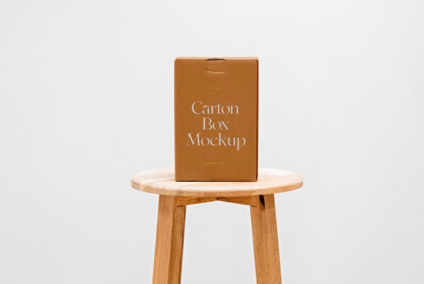 A cardboard box mockup standing on a wooden chair.