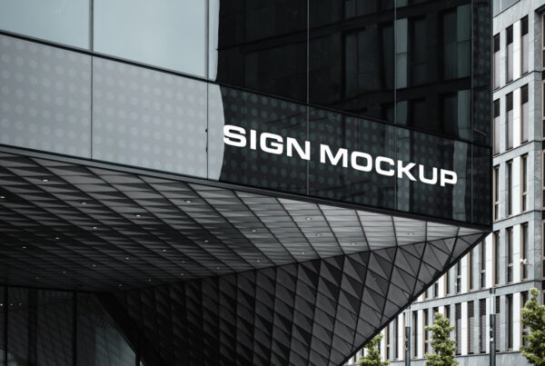Sign mockup on corporate building in the city center.