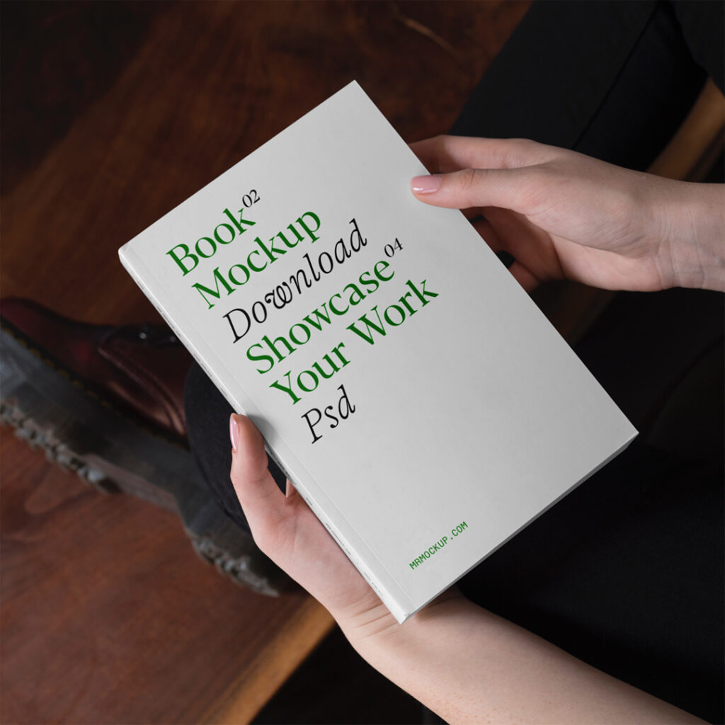 A white cover book mockup in a woman's hands.