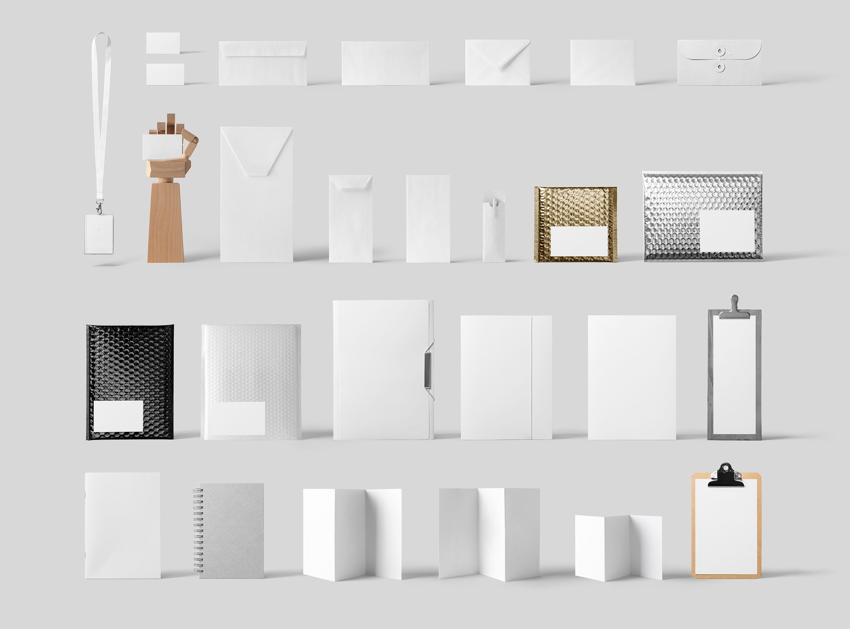 Front view of business cards, envelope, folders, notebooks, Id, clipboards, bubble envelopes from Front View Mockups.