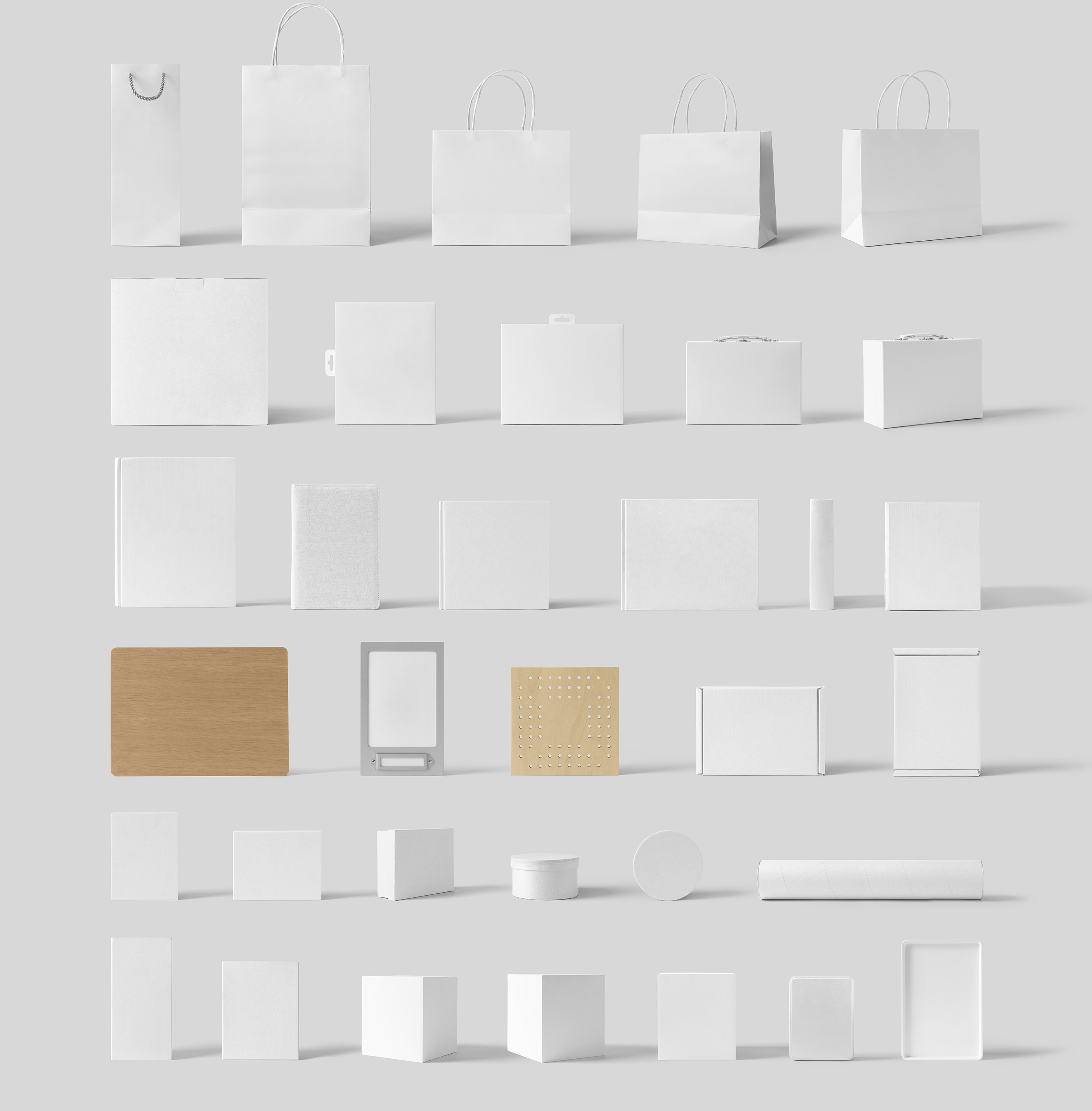 Front view of bags, cases, books and notebook, boxes, tube from Front View Mockups.