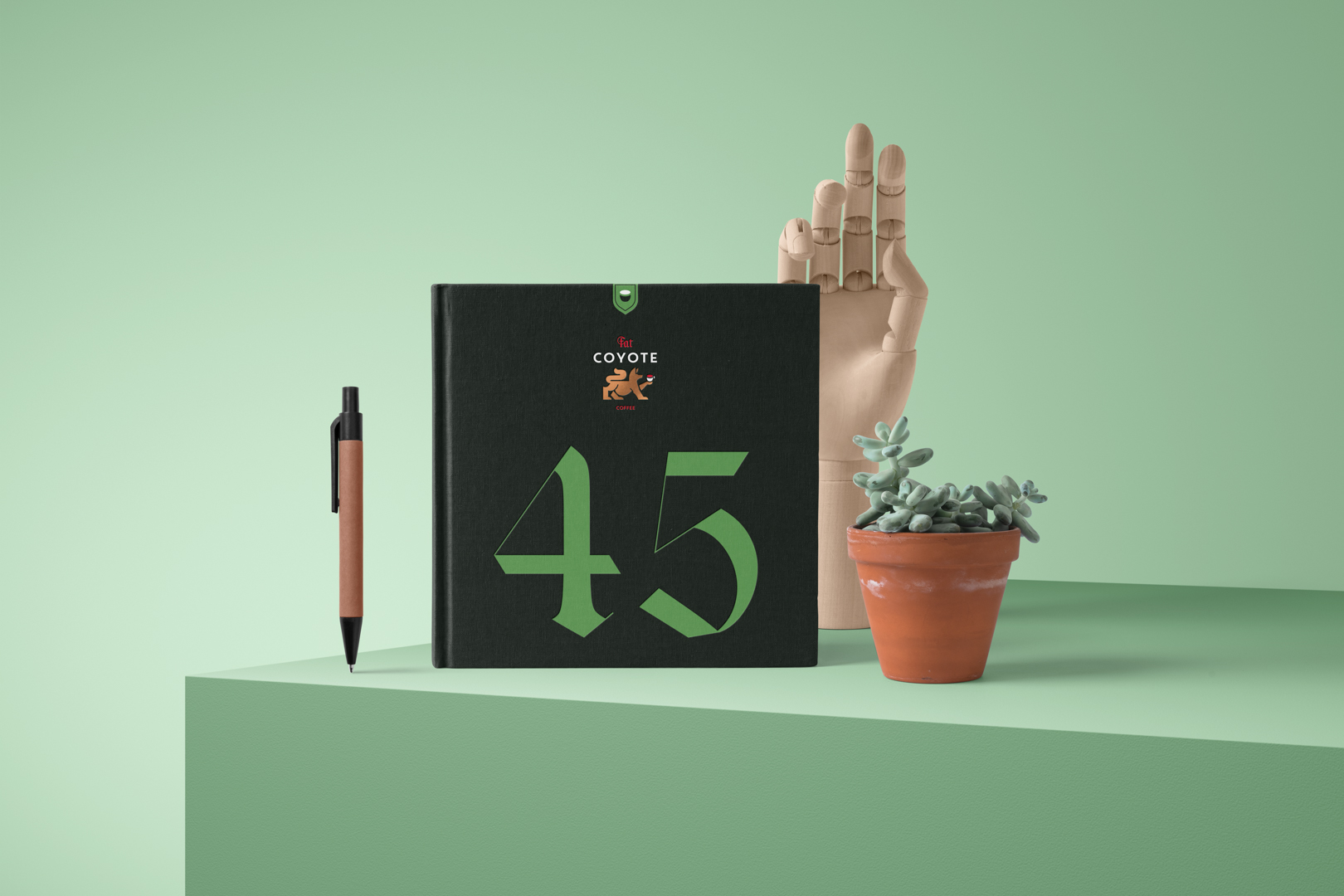 Notebook project with deboss and foil effect made with Front View Mockups.