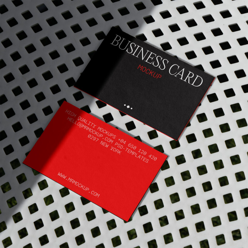 Business cards lying on a white trellised chair