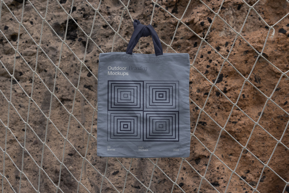 Outdoor branding mockups scene with canvas bag on the net.