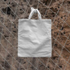 White canvas bag on the net from outdoor branidng mockups.