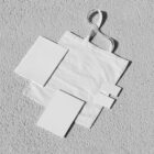 White canvas bag, notebook, card and buisness cards from outdoor branding mockups.