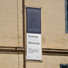 Banner on the old building from outdoor branding mockups.
