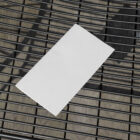 White brochure on the metal chair from outdoor branding mockups.