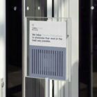 Transparent stand with a card inside from outdoor branding mockups.