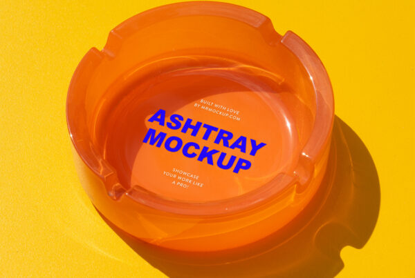 Ashtray Mockup laying on a yellow table.