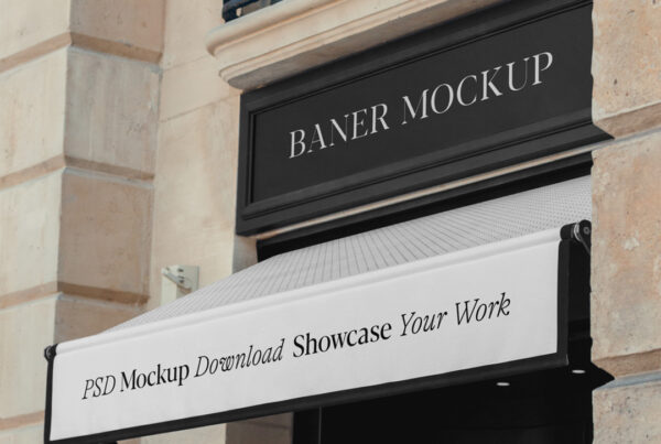 Free Black Banner & White Awning Mockup view on top of the entry to the hotel.