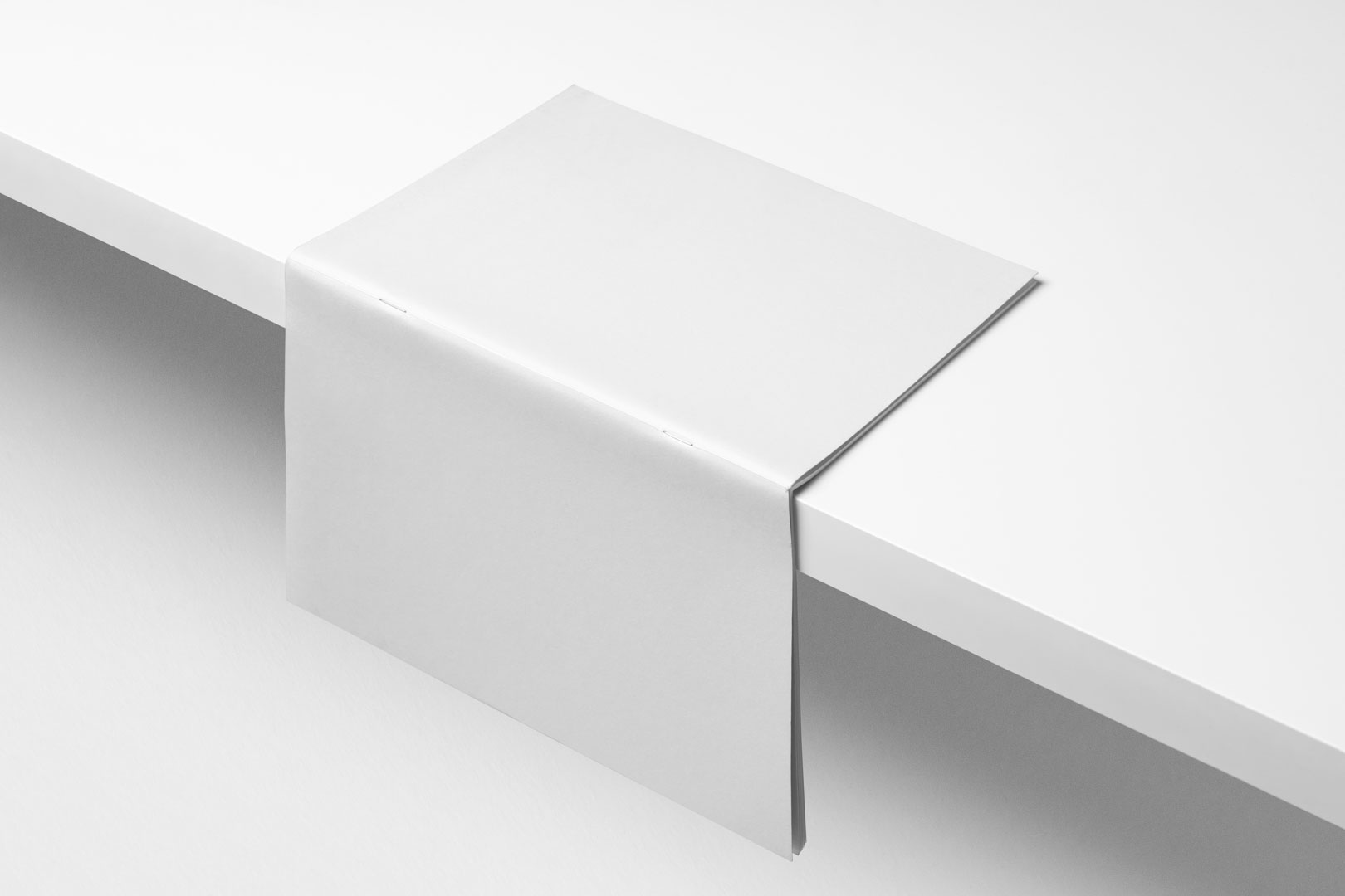 Seen from the above, Open and cover up Blank Magazine Branding Mockup laying on the white box above white background.