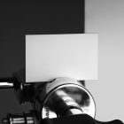 Seen from the front, White Business Card Branding Mockups attached to a tripod.