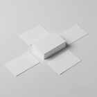 Seen from the above, Blank Business Cards Mockup composition arranged around each other laying on the white floor.
