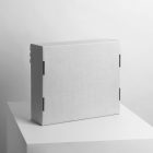 Blank Box Branding Mockup scene seen from front standing on white cubic.