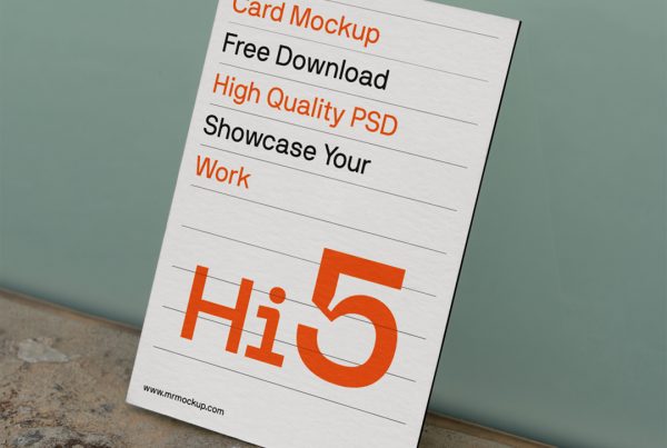 The Free Card Mockup seen from the front is standing on the rock floor and based on the green wall.