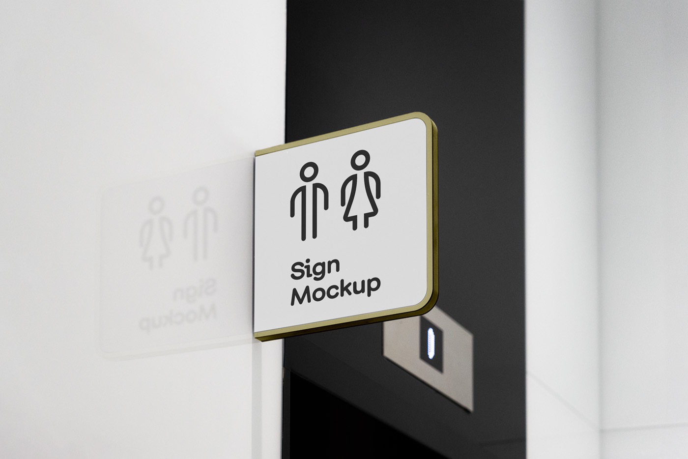 Free Modern Sign Mockup seen from the front is attached to the white wall with golden frame against elevators.