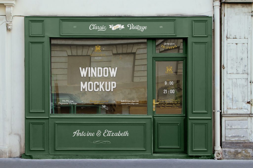 Seen from the front, Free Retail Storefront Mockup in green colors on building and gold colors on windows.