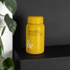 Flask Bottle Branding Mockups Kit with yellow design seen from the front is standing on the black wooden stairs.