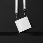 Blank ID Lanyard Branding Mockups Kit seen from front and located on the black wooden stairs.