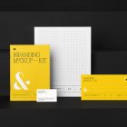 Stationery Set like Card, Business Cards, Envelope, Branding Mockups Kit with yellow design seen from front and located on the black wooden stairs are arranged in nice composition.