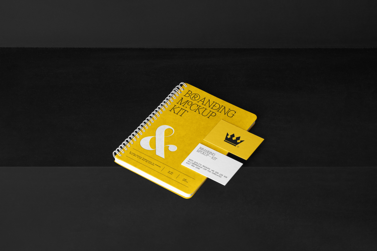 Notebook and Business Cards Branding Mockups Kit with yellow design seen from above and located on the black wooden stairs are arranged in composition.