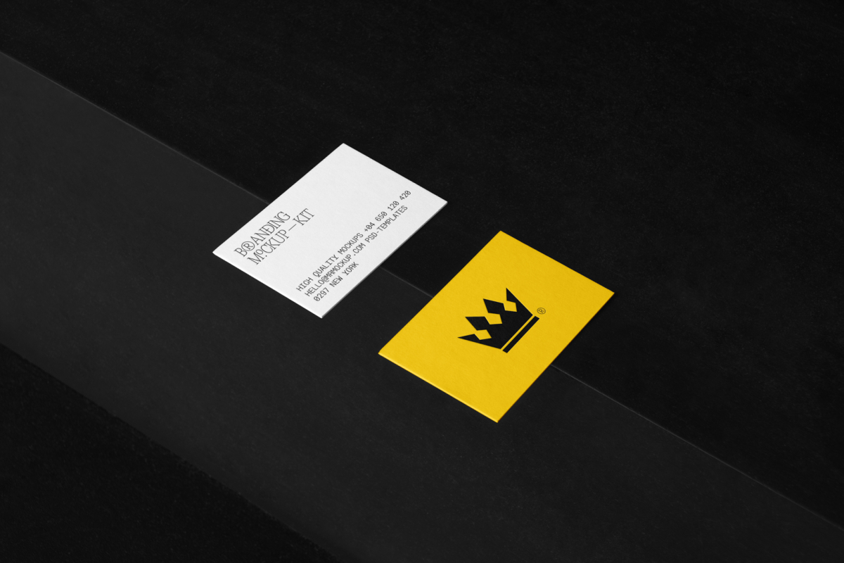Business Cards Branding Mockups Kit with yellow design seen from above and located on the black wooden stairs.