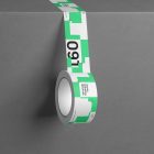 Seen from front unrolled adhesive Tape Branding Mockup with a modern green design attached to a dark color box.