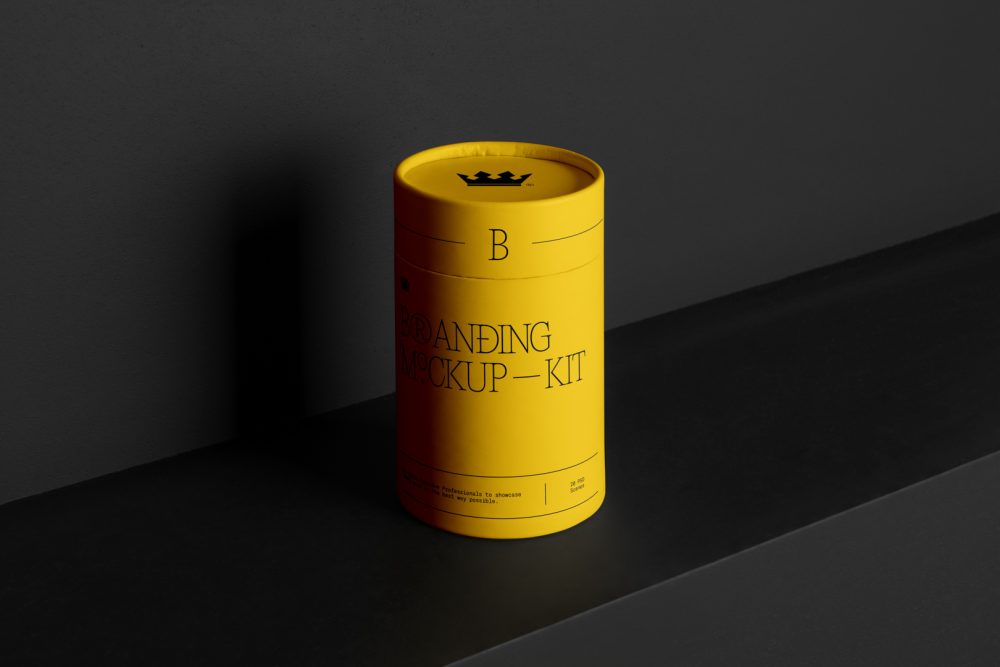 Tube Branding Mockups Kit with yellow design seen from front and located on the black wooden stairs.