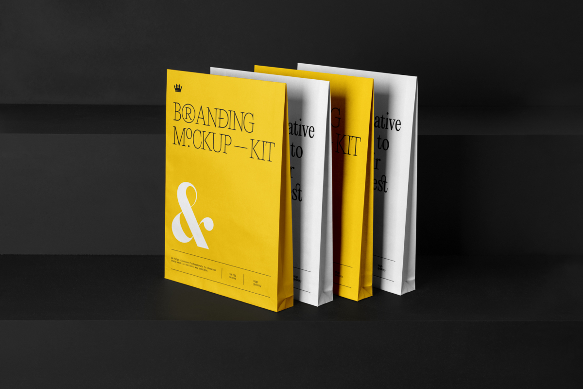 Four Craft Bags Branding Mockups Kit with yellow design seen from front and located on the black wooden stairs.
