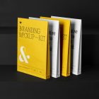 Four Craft Bags Branding Mockups Kit with yellow design seen from front and located on the black wooden stairs.
