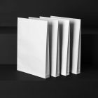 Four White Craft Bags Branding Mockups Kit, seen from the front and located on the black wooden stairs.